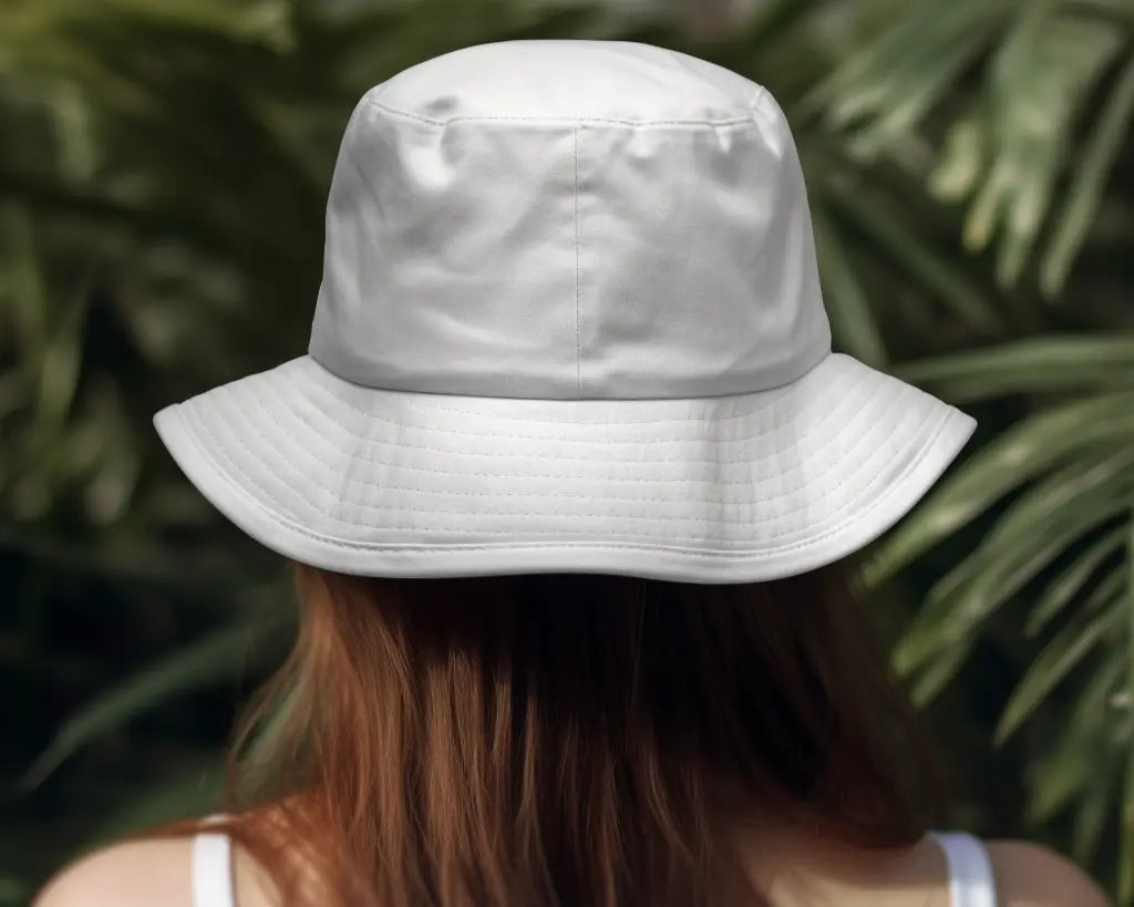 a girl wearing a clean white bucket hat