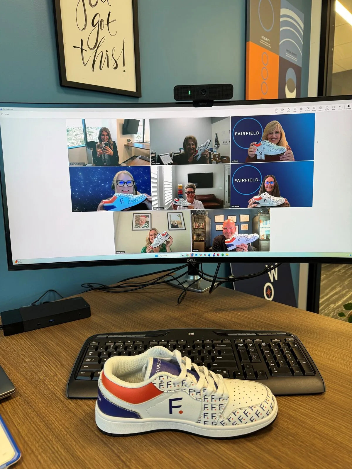 Fairfield team showing off custom F-pattern branded sneakers on Teams call